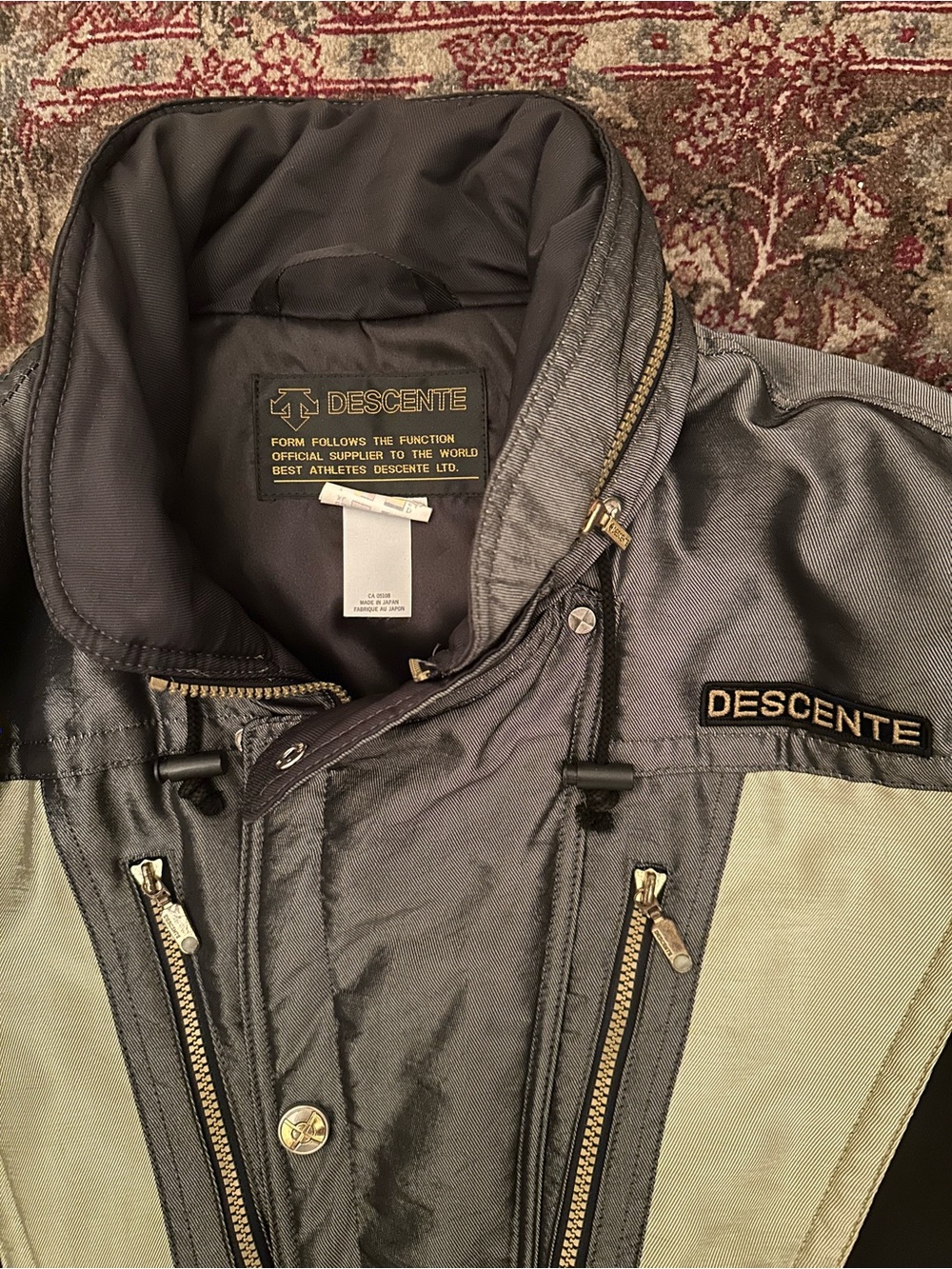 Descente Men's metallic Gray Ski suit with Gold Accents